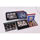 G.B. - Royal Mint proof coin sets to include 1984 (blue case), 2001, 2002, 2003, 2004 (N.B. In red l