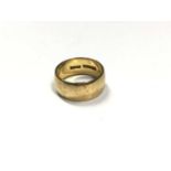 1960s 22ct gold wide band wedding ring with engraved leaf decoration