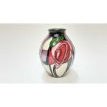 Moorcroft pottery vase decorated in the Glasgow Rose pattern by Emma Bossons, 2 star design, dated 2