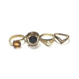 Two 18ct gold gem set dress rings, 9ct gold cultured pearl ring and 9ct gold wishbone ring (4)