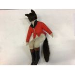 Case Roma toy fox dressed as a huntsman