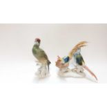 Karl Ens porcelain model of a green Woodpecker, impressed 7527, 25cm high, together with another Kar