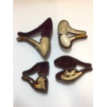 Four cased Meerschaum pipes, including one by Ludwig Hartmann & Eidam Wien, one of a confederate sol