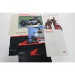 Group of 1980s and early 1990s Honda motorcycle and ATV sales brochures and press kits (qty)