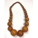 Vintage simulated amber bead necklace