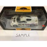 Three boxes of 1:18 metal die cast models cars to include Hot Wheels Cadillac LMP, Kyosho Die-cast c