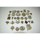 Collection of twelve Scottish military cap badges to include Argyll and Sutherland Highlanders, Came