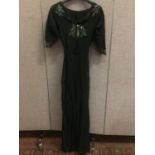 1930's full length cocktail dress / party dress in black crepe with glass beading and rhinestones.