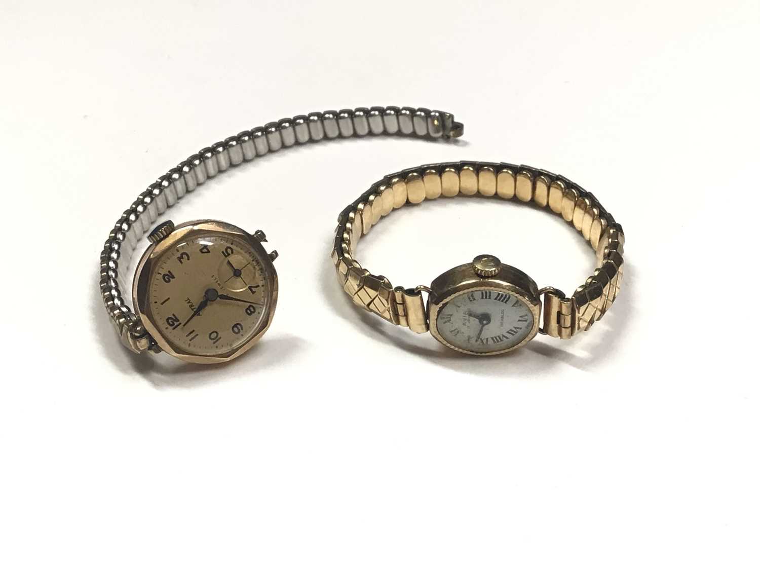 Two 9ct gold cased ladies wristwatches, both on expandable plated bracelets