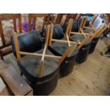 A set of eight vintage beech framed curved back shop chairs with studded leatherette upholstery, set
