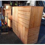 Two square slatted pine shop display stages - sold with four further smaller similar
