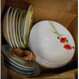 A box containing a quantity of plates and other china