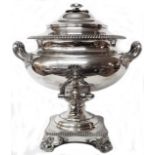 A late 19th Century large silver plated samovar with iron core heating, flanking acanthus handles