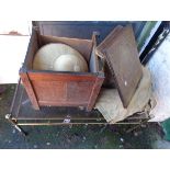 An old oak locker box (lid detached) containing a vintage pith style helmet - sold with a vintage