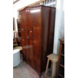 A 95cm Beithcraft (Scotland) reproduction mahogany double wardrobe with hanging space and shelves