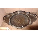 A 62cm old silver plated serpentine gallery tray - sold with a plated circular tray with central