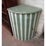 A 70cm painted wood corner washstand cabinet with lift-top bow front cupboard and striped finish