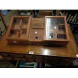 A vintage stained wood and glazed Henri Wintermans counter top cigar display case