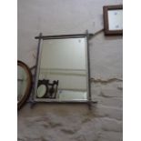 A limed oak cross framed oblong wall mirror