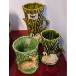 Two SylvaC pottery spill vases each decorated with swans of various sizes - sold with a smaller posy