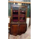 An 82cm early 19th Century rosewood and boulle work cabinet with material lined interior enclosed by