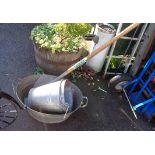 A galvanised tin bath, two galvanised buckets and a long handled shovel