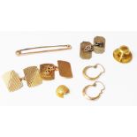 A pair of 9ct. gold cuff-links with engine turned decoration, pair of small 9ct. hoop ear-rings, 9ct