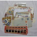 A small collection of posted letters, stamps on paper and a set of 1961 Chad Valley projector slides