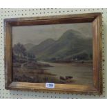 JMF: a gilt framed early 20th Century oil on canvas, depicting cattle watering in a lakeland