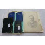A small sketch album with pencil portraits and drawings, several posed photographic groups, four