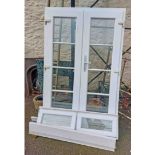 A uPVC French door with separate double window pediment, etc.