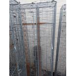 A vintage three door changing room locker of galvanised cage form