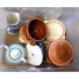 A crate containing a quantity of ceramic items