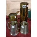 A WWII brass shell case - sold with a brass hot water jug (no lid) and two pewter tankards
