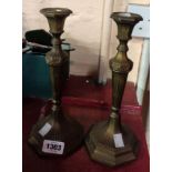 A pair of 20th Century cast brass candlesticks in the Georgian style