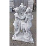 A concrete garden statue depicting The Three Graces