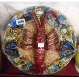 A Caldas majolica wall plaque in the Palissy manner depicting a lobster and shellfish with