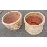 A terracotta plant pot of urn form decorated with applied tudor rose bosses - sold with another