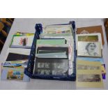 A crate containing a collection of mint Commonwealth royal commemorative stamps in stock sleeves and