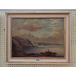 F.J. Elliott: a framed oil on board, depicting a coastal scene with figures fishing - signed -