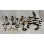 A set of blacksmith made metal figures depicting cowboys at a hoedown