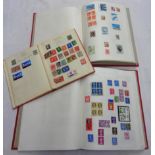 Two Barclay red stamp albums, one containing a collection of mint and used 20th Century GB stamps,