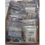 A box containing a large collection of early to late 20th Century world travel postcards contained
