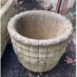 A concrete garden planter of urn form