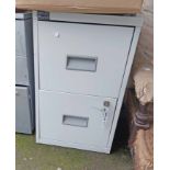 A two drawer Officeworld filing cabinet with key