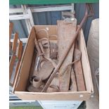 A box containing a quantity of woodworking and garden tools including saw, rake and hoe head, etc.