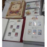 Two Stanley Gibbons red Royal Events stamp albums, one containing mint Commonwealth royal