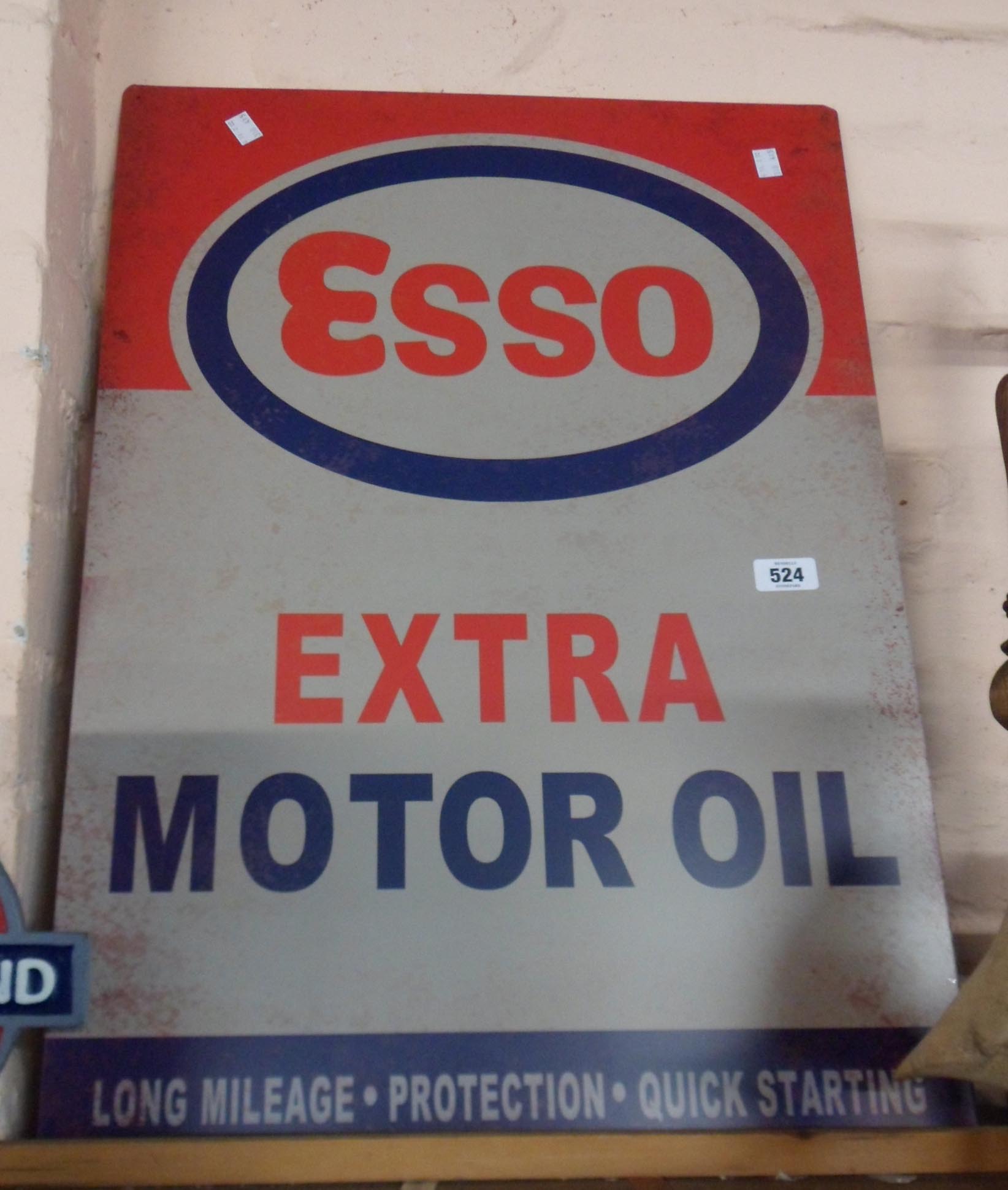 A large modern printed tin Esso sign