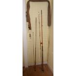 An 8' 6" vintage two section split cane fishing rod - label missing - in W.H. Hamlin canvas bag -