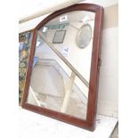 A vintage stained wood framed wall mirror with arched plate - from a dressing table
